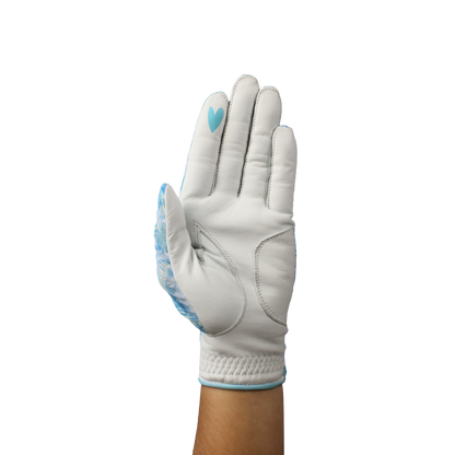 Ladies golf glove with blue and white tropical patterns