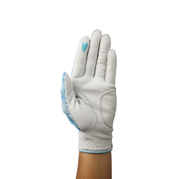 Ladies golf glove with blue and white tropical patterns