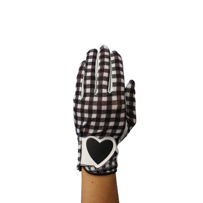 Ladies golf glove with black and white checker pattern
