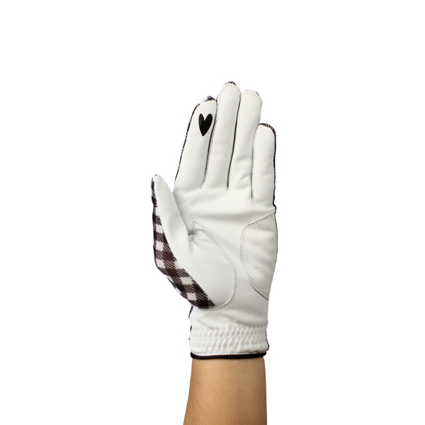 Ladies golf glove with black and white checker pattern