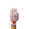 Ladies golf glove with wine glasses and red hearts