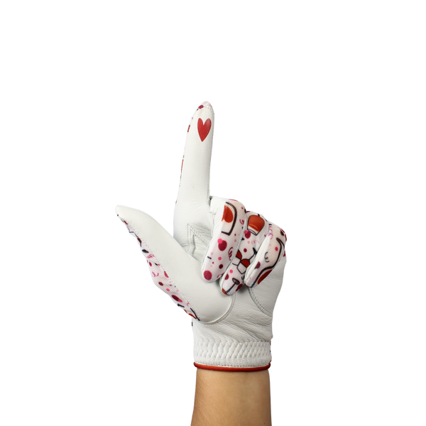Ladies golf glove with wine glasses and red hearts
